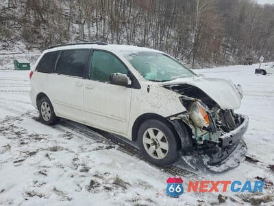 Czwarte zdjęcie samochodu z boku: 2009 TOYOTA SIENNA LE 8-PASSENGER VIN:5TDZK23C89S236456 - miniatura