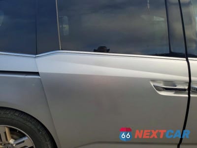 Zdjęcie 11 z 12 samochodu: 2012 HONDA ODYSSEY TOURING VIN:5FNRL5H91CB072426 - miniatura