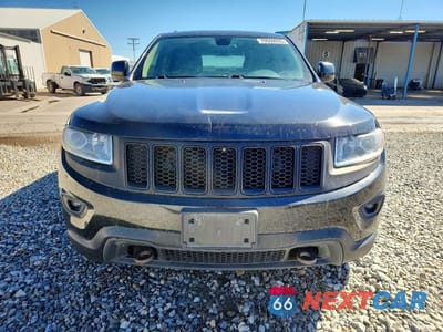 Piąte zdjęcie samochodu w środku: 2015 JEEP GRAND CHEROKEE LAREDO VIN:1C4RJFAG4FC790607 - miniatura