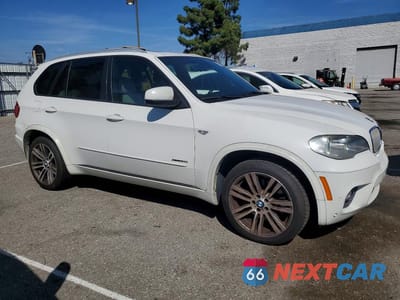 Czwarte zdjęcie samochodu z boku: 2012 BMW X5 XDRIVE50I VIN:5UXZV8C50CL424763 - miniatura