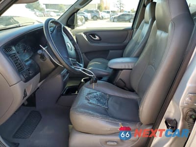 Zdjęcie 7 z 13 samochodu: 2001 MAZDA TRIBUTE LX VIN:4F2YU09151KM33063 - miniatura