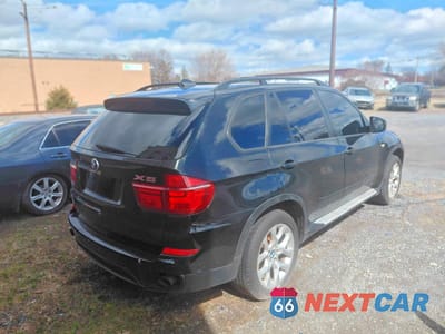 Czwarte zdjęcie samochodu z boku: 2011 BMW X5 XDRIVE35I VIN:5UXZV4C50BL742356 - miniatura