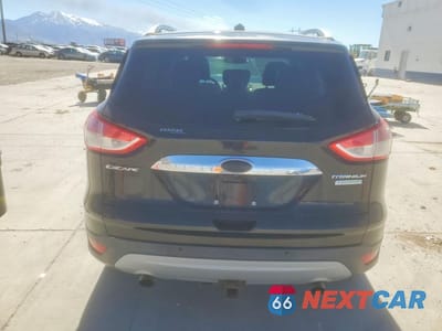 Zdjęcie 6 z 12 samochodu: 2014 FORD ESCAPE TITANIUM VIN:1FMCU0J92EUE06887 - miniatura