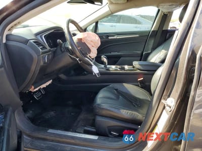 Zdjęcie 7 z 12 samochodu: 2015 FORD FUSION TITANIUM VIN:3FA6P0K95FR252701 - miniatura