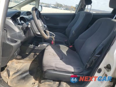 Zdjęcie 7 z 12 samochodu: 2013 HONDA FIT VIN:JHMGE8H32DC048938 - miniatura