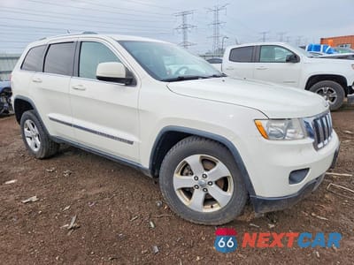 Czwarte zdjęcie samochodu z boku: 2012 JEEP GRAND CHEROKEE LAREDO VIN:1C4RJFAG9CC219903 - miniatura