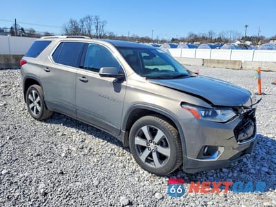 Czwarte zdjęcie samochodu z boku: 2018 CHEVROLET TRAVERSE LT VIN:1GNEVHKW5JJ144086 - miniatura