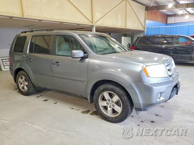 Czwarte zdjęcie samochodu z boku: 2009 HONDA PILOT EXL VIN:5FNYF38609B016516 - miniatura