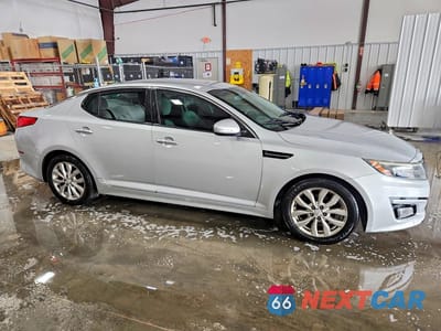 Czwarte zdjęcie samochodu z boku: 2014 KIA OPTIMA LX VIN:5XXGM4A7XEG326612 - miniatura