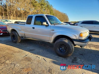 Czwarte zdjęcie samochodu z boku: 2004 MAZDA B3000 CAB PLUS VIN:4F4YR16UX4TM00815 - miniatura