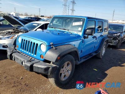 2010 JEEP WRANGLER UNLIMITED SPORT 1J4HB3H15AL214469 - główne zdjęcie licytacji z USA - miniatura