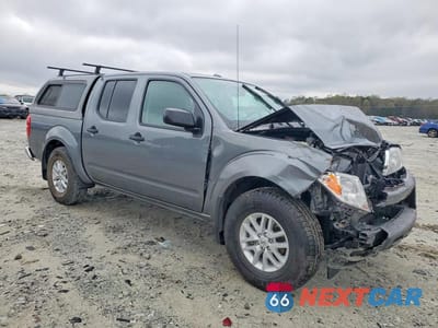 Czwarte zdjęcie samochodu z boku: 2017 NISSAN FRONTIER SV VIN:1N6DD0ER5HN771109 - miniatura
