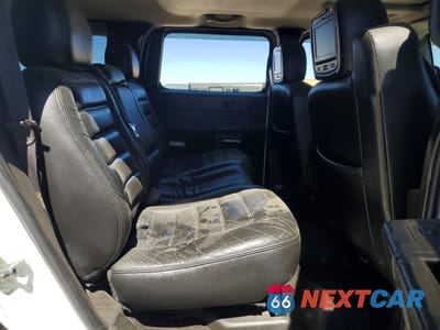 Zdjęcie 11 z 13 samochodu: 2006 HUMMER H2 VIN:5GRGN23U46H107619 - miniatura