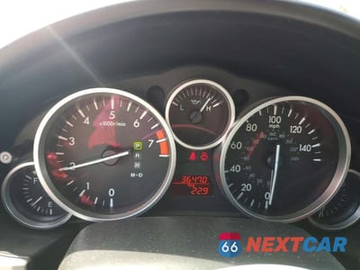 Zdjęcie 9 z 11 samochodu: 2009 MAZDA MX-5 MIATA VIN:JM1NC25FX90200354 - miniatura