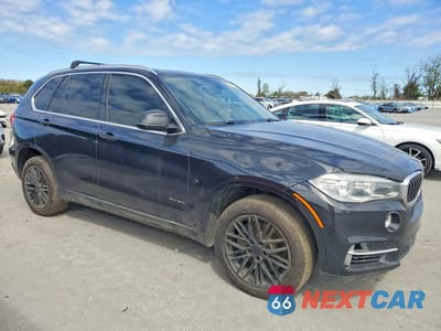 Czwarte zdjęcie samochodu z boku: 2015 BMW X5 XDRIVE50I VIN:5UXKR6C5XF0J79471 - miniatura