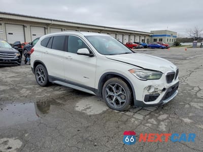 Czwarte zdjęcie samochodu z boku: 2017 BMW X1 XDRIVE28I VIN:WBXHT3C31H5F80509 - miniatura