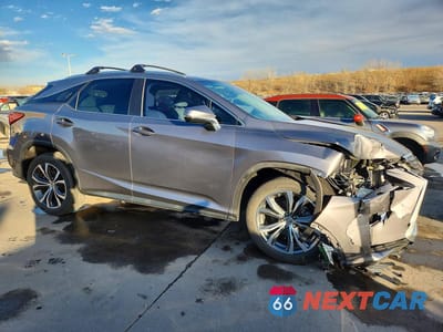 Czwarte zdjęcie samochodu z boku: 2017 LEXUS RX 350 BASE VIN:2T2BZMCA8HC083636 - miniatura