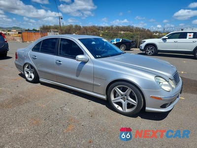 Czwarte zdjęcie samochodu z boku: 2003 MERCEDES-BENZ E 55 AMG VIN:WDBUF76J93A380185 - miniatura
