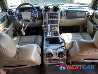 Zdjęcie 8 z 13 samochodu: 2003 HUMMER H2 VIN:5GRGN23U43H107700 - miniatura