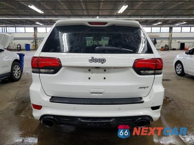 Zdjęcie 6 z 12 samochodu: 2014 JEEP GRAND CHEROKEE SRT-8 VIN:1C4RJFDJ0EC217645 - miniatura