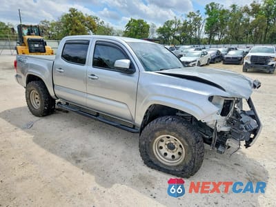 Czwarte zdjęcie samochodu z boku: 2023 TOYOTA TACOMA SR V6 VIN:3TMCZ5AN4PM578698 - miniatura