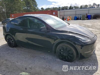 Czwarte zdjęcie samochodu z boku: 2022 TESLA MODEL Y LONG RANGE VIN:7SAYGDEE7NF387457 - miniatura