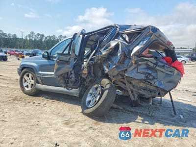 Drugie zdjęcie samochodu z przodu: 2001 JEEP GRAND CHEROKEE LAREDO VIN:1J4GW48S71C662985 - miniatura