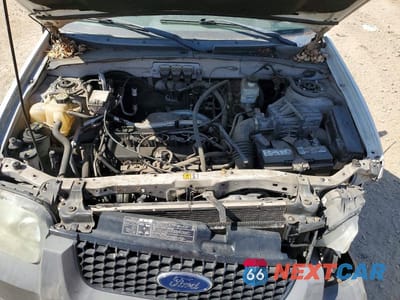 Zdjęcie 12 z 13 samochodu: 2006 FORD ESCAPE XLS VIN:1FMYU02ZX6KA98904 - miniatura