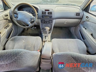 Zdjęcie 8 z 11 samochodu: 2001 TOYOTA COROLLA LE VIN:1NXBR12E71Z517606 - miniatura