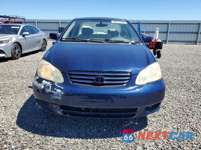 Piąte zdjęcie samochodu w środku: 2004 TOYOTA COROLLA LE VIN:JTDBR32E242035321 - miniatura