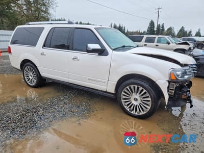 Czwarte zdjęcie samochodu z boku: 2015 LINCOLN NAVIGATOR L VIN:5LMJJ3JT3FEJ07320 - miniatura