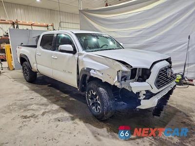 Czwarte zdjęcie samochodu z boku: 2022 TOYOTA TACOMA TRD OFF-ROAD VIN:3TYDZ5BN3NT014903 - miniatura