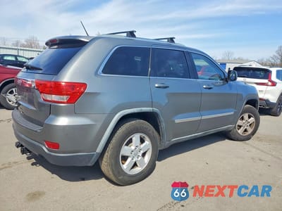 Trzecie zdjęcie samochodu z tyłu: 2012 JEEP GRAND CHEROKEE LAREDO VIN:1C4RJEAGXCC142260 - miniatura