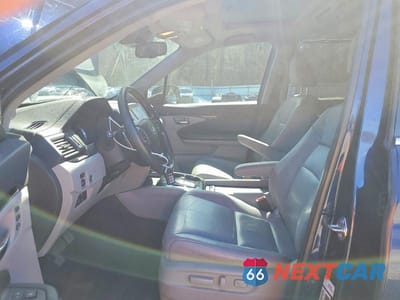 Zdjęcie 7 z 13 samochodu: 2016 HONDA PILOT TOURING VIN:5FNYF6H93GB006006 - miniatura