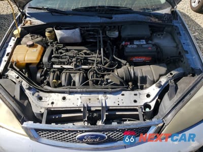 Zdjęcie 11 z 12 samochodu: 2005 FORD FOCUS ZX5 VIN:3FAFP37N25R122168 - miniatura