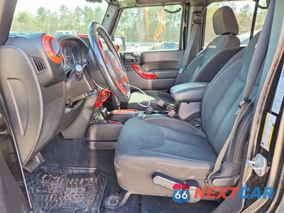 Zdjęcie 7 z 11 samochodu: 2015 JEEP WRANGLER UNLIMITED SAHARA VIN:1C4BJWEG1FL732742 - miniatura