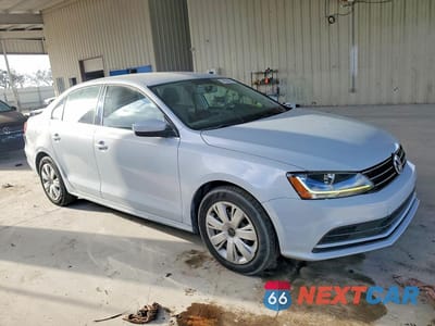 Czwarte zdjęcie samochodu z boku: 2017 VOLKSWAGEN JETTA 4D S VIN:3VW2B7AJ0HM374200 - miniatura