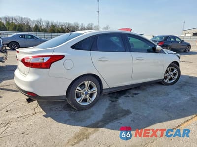 Trzecie zdjęcie samochodu z tyłu: 2013 FORD FOCUS VIN:1FADP3F2XDL123712 - miniatura