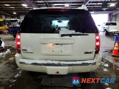 Zdjęcie 6 z 12 samochodu: 2011 GMC YUKON DENALI VIN:1GKS2EEF6BR257308 - miniatura