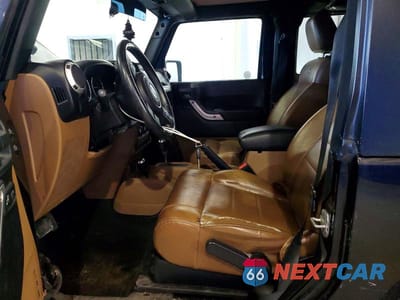 Zdjęcie 7 z 11 samochodu: 2011 JEEP WRANGLER SAHARA VIN:1J4AA5D12BL538454 - miniatura