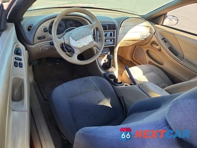 Zdjęcie 8 z 12 samochodu: 1999 FORD MUSTANG VIN:1FAFP4047XF136378 - miniatura