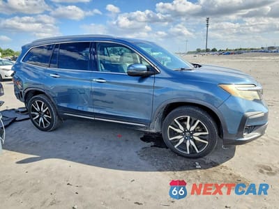 Czwarte zdjęcie samochodu z boku: 2019 HONDA PILOT TOURING VIN:5FNYF5H64KB003267 - miniatura