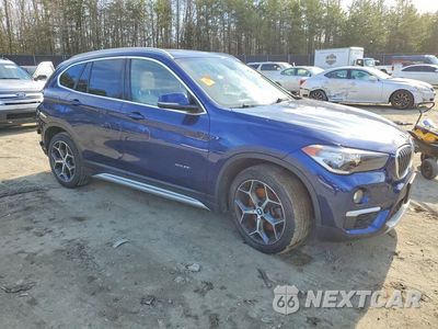 Czwarte zdjęcie samochodu z boku: 2018 BMW X1 XDRIVE28I VIN:WBXHT3C3XJ5F89344 - miniatura