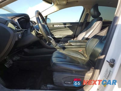 Zdjęcie 7 z 12 samochodu: 2017 FORD FUSION TITANIUM VIN:3FA6P0K90HR111120 - miniatura