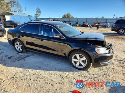 Czwarte zdjęcie samochodu z boku: 2014 VOLKSWAGEN PASSAT SE VIN:1VWBH7A31EC015676 - miniatura