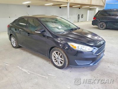 Czwarte zdjęcie samochodu z boku: 2017 FORD FOCUS SE VIN:1FADP3F2XHL223282 - miniatura