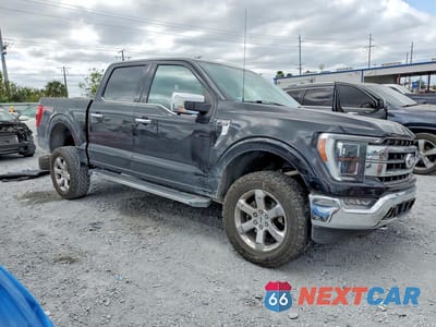 Czwarte zdjęcie samochodu z boku: 2021 FORD F150 SUPERCREW VIN:1FTFW1E81MKD30981 - miniatura