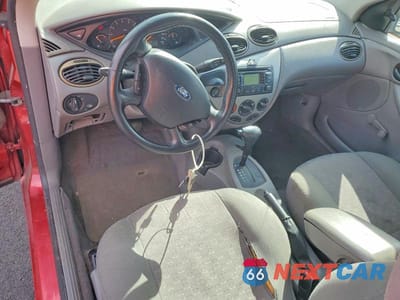 Zdjęcie 8 z 12 samochodu: 2004 FORD FOCUS ZX3 VIN:3FAFP31324R121043 - miniatura