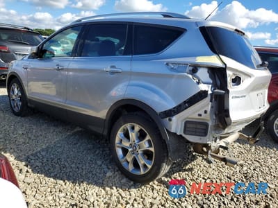 Drugie zdjęcie samochodu z przodu: 2014 FORD ESCAPE TITANIUM VIN:1FMCU9J90EUD26377 - miniatura