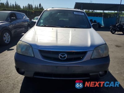 Piąte zdjęcie samochodu w środku: 2001 MAZDA TRIBUTE LX VIN:4F2YU09151KM33063 - miniatura